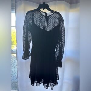 Black mesh dress with cinch waist and wrists